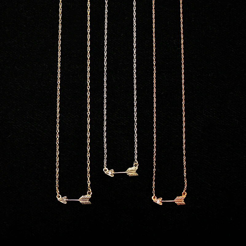 Tiny Arrow Necklace in Recycled Gold by 720