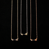 Tiny Arrow Necklace in Recycled Gold by 720