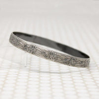 The Art Nouveau Patterned Sterling Bangle from Allie B.