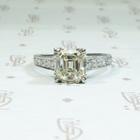 1.46 carat emerald step cut antique diamond engagement ring in platinum