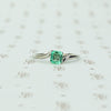 mid century platinum and emerald engagement ring