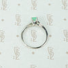 mid century platinum and emerald engagement ring side view