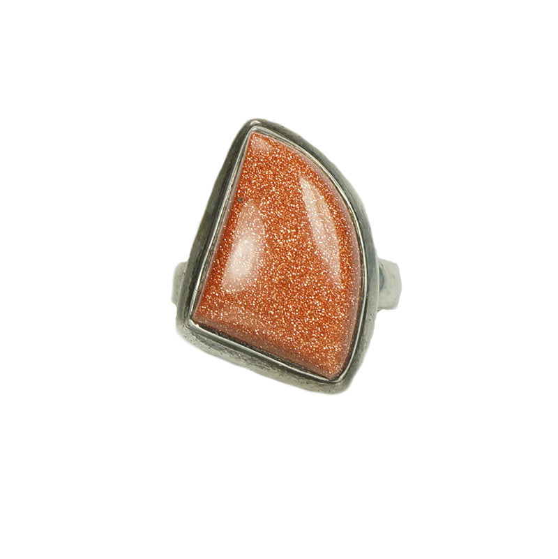 asymmetrical sterling silver ring with a sparkling piece of goldstone