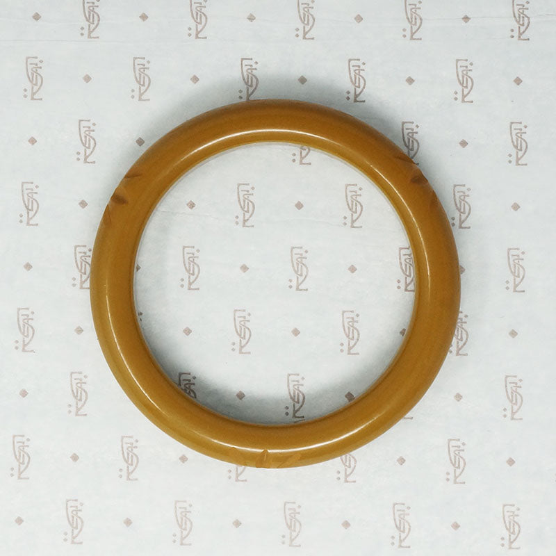 Bakelite Bangle with Stylized Hawaiian Blossom