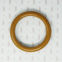 Bakelite Bangle with Stylized Hawaiian Blossom