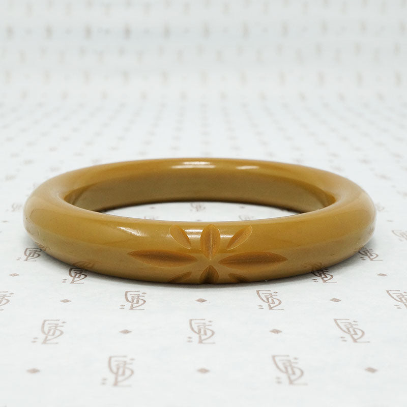 Bakelite Bangle with Stylized Hawaiian Blossom
