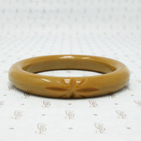 Bakelite Bangle with Stylized Hawaiian Blossom