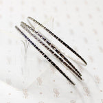 set of four slim sterling silver bangles