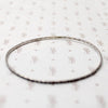 set of four slim sterling silver bangles