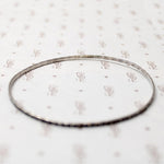 set of four slim sterling silver bangles