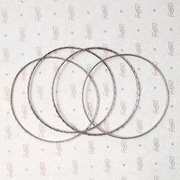 set of four slim sterling silver bangles