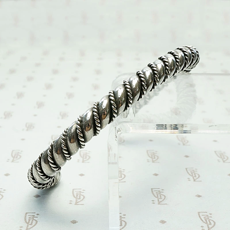 Meta Cuff Bracelet with a Twist