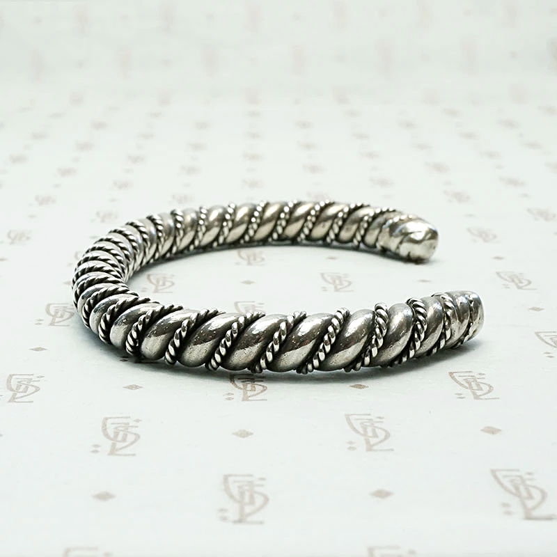 Meta Cuff Bracelet with a Twist
