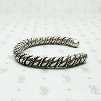 Meta Cuff Bracelet with a Twist