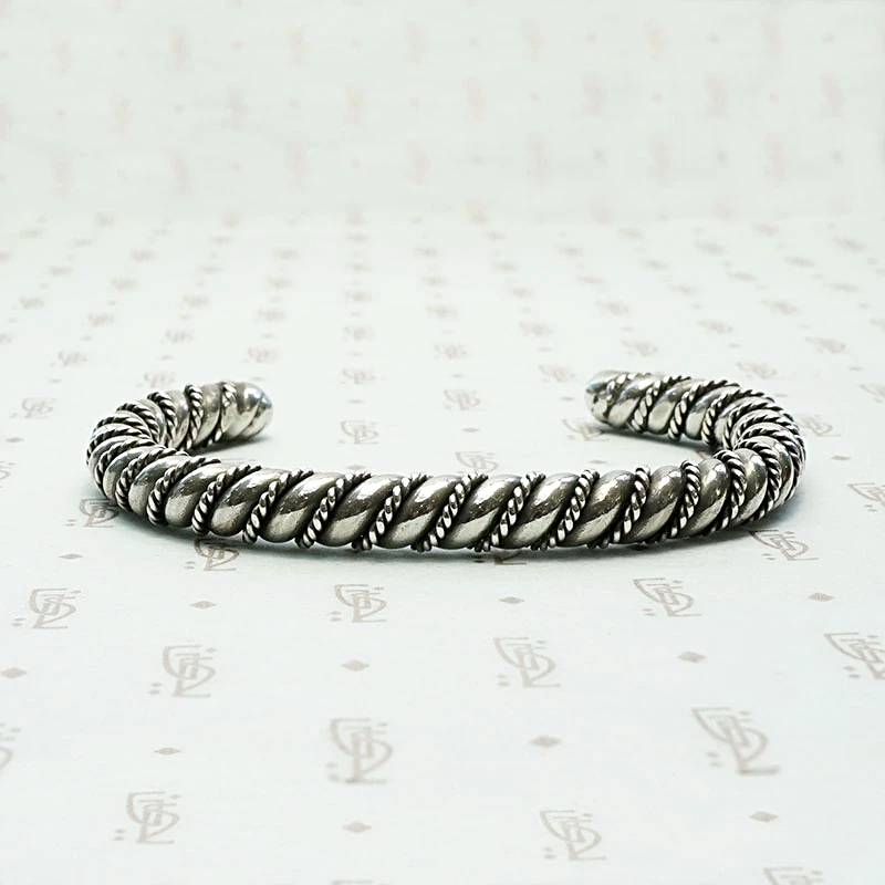 Meta Cuff Bracelet with a Twist