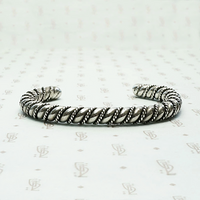 Meta Cuff Bracelet with a Twist