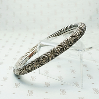 Hand Engraved Repoussé Silver Bangle