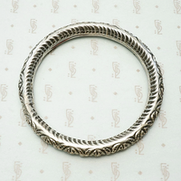 Hand Engraved Repoussé Silver Bangle