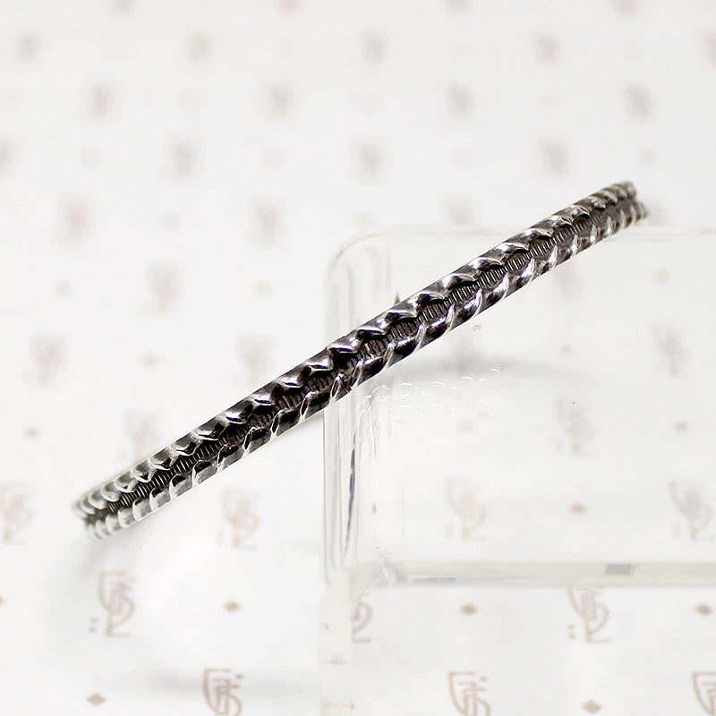 Edgy Twisted Plait Sterling Silver Bangle 