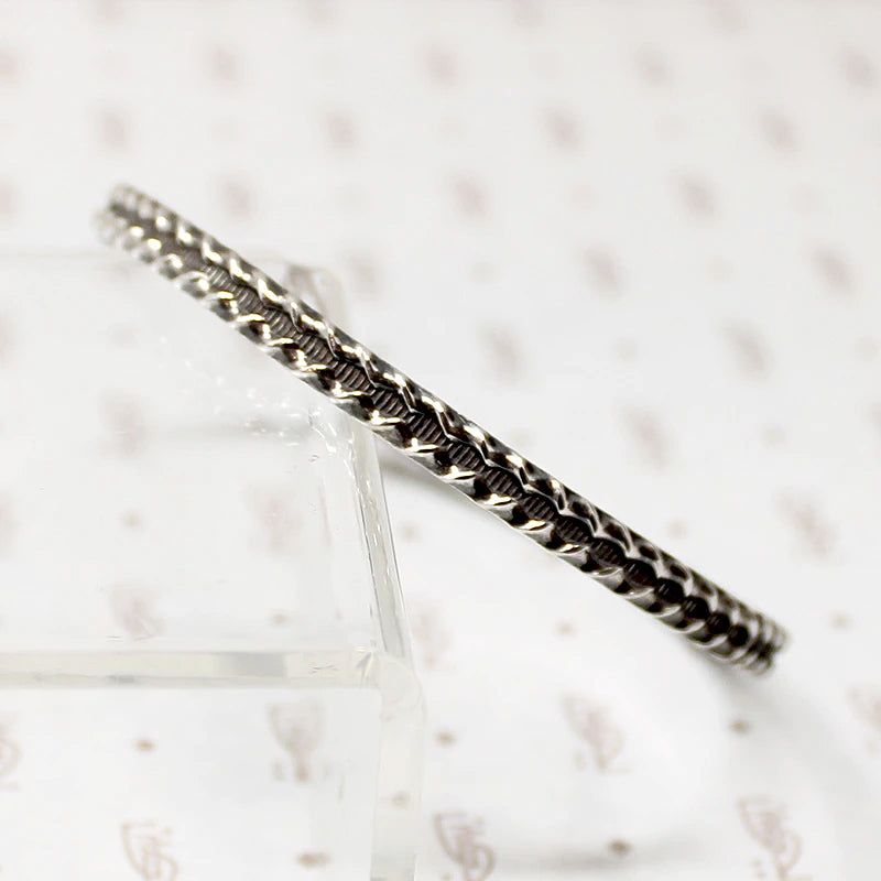 Edgy Twisted Plait Sterling Silver Bangle 