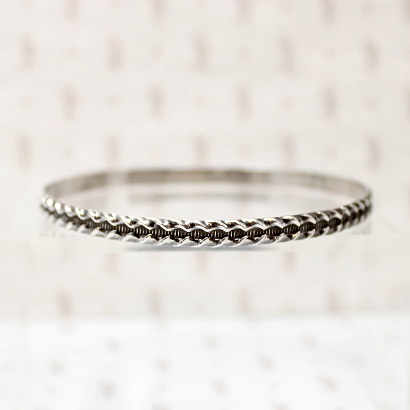 Edgy Twisted Plait Sterling Silver Bangle 