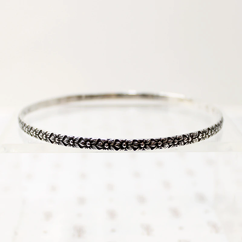 Crisply Engraved Flower Bangle Signed "Sterl-Hedy"