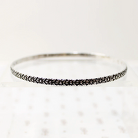 Crisply Engraved Flower Bangle Signed "Sterl-Hedy"