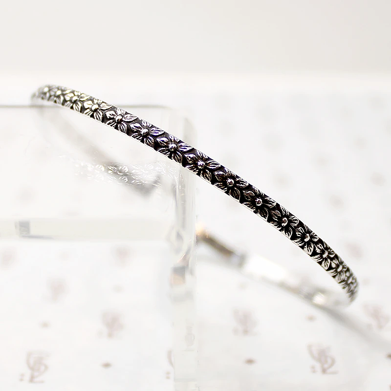 Crisply Engraved Flower Bangle Signed "Sterl-Hedy"