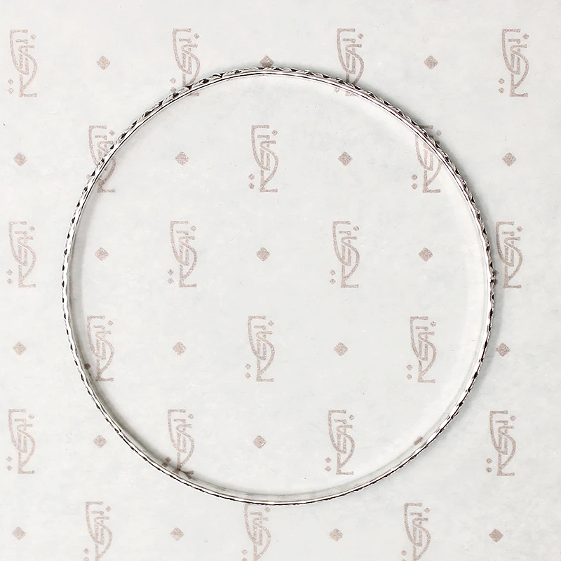 Crisply Engraved Flower Bangle Signed "Sterl-Hedy"