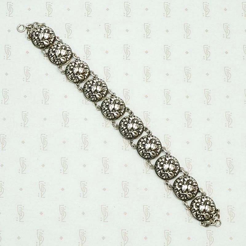 Cheerful Sterling Repoussé Daisy Bracelet