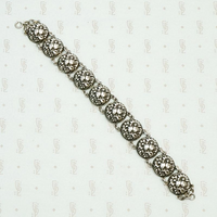 Cheerful Sterling Repoussé Daisy Bracelet