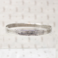 Subtly Hammered 1970s Brutalist Silver Bangle