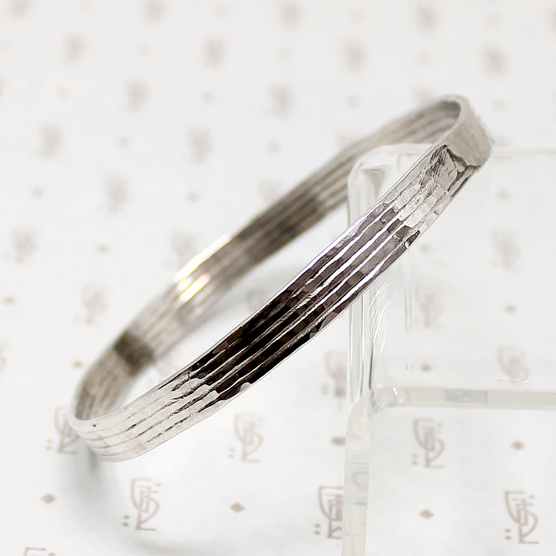 Subtly Hammered 1970s Brutalist Silver Bangle