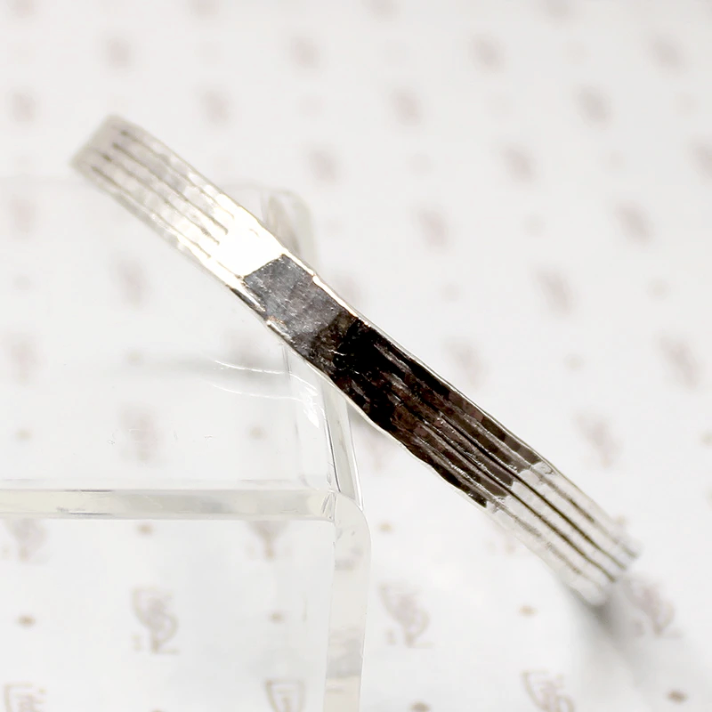 Subtly Hammered 1970s Brutalist Silver Bangle