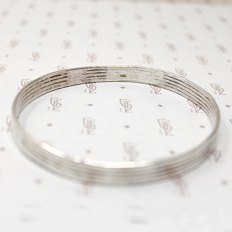 Subtly Hammered 1970s Brutalist Silver Bangle