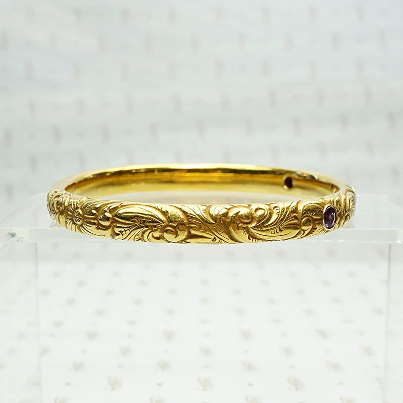 American Art Nouveau 14k Repoussé Bangle Bracelet set with Amethysts. Side view.