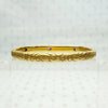 American Art Nouveau 14k Repoussé Bangle Bracelet set with Amethysts. Back view.