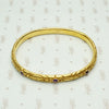 American Art Nouveau 14k Repoussé Bangle Bracelet set with Amethysts. Top view.