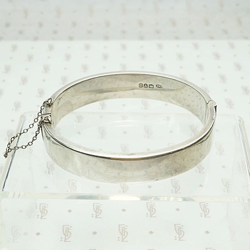 English Victorian Revival Engraved Silver Bangle. Hallmark view.