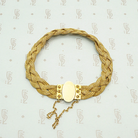 Striking Woven Gold Bracelet with Etruscan Revival Detail