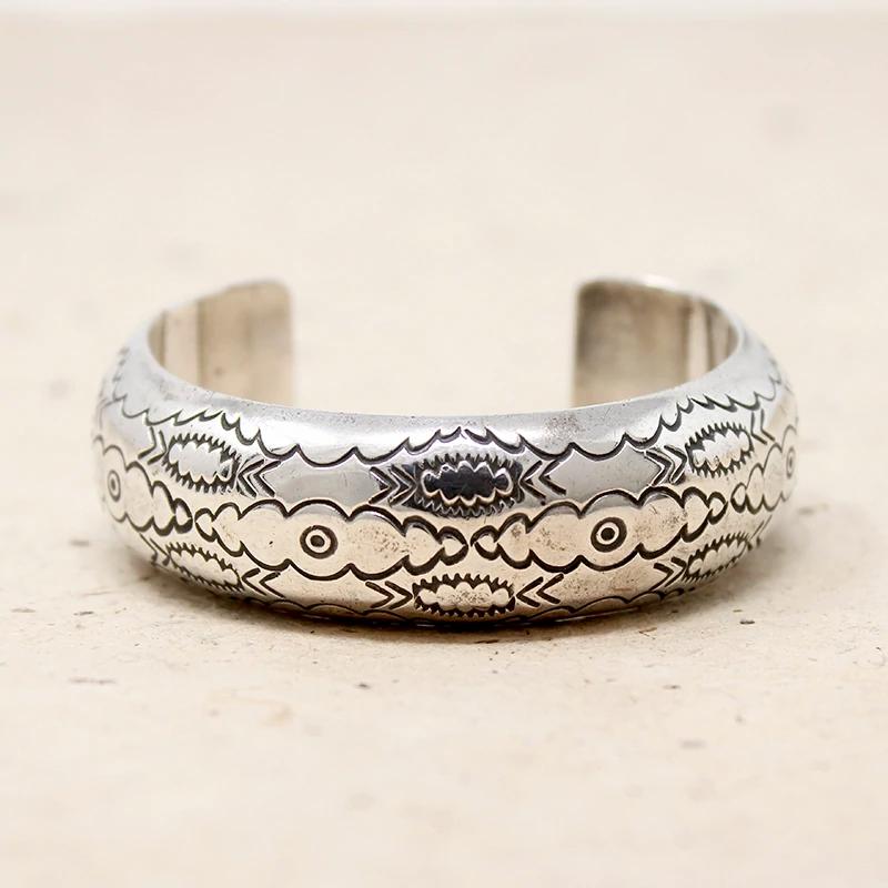 Domed Silver Cuff with Rocker Designs by Bighand