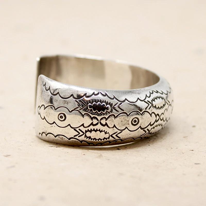 Domed Silver Cuff with Rocker Designs by Bighand