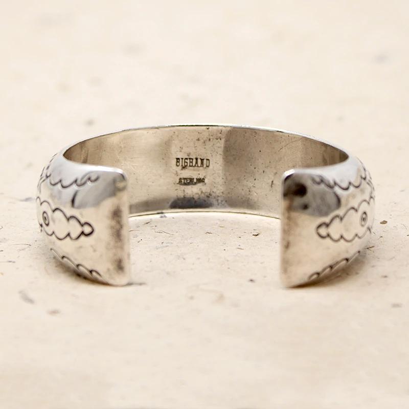Domed Silver Cuff with Rocker Designs by Bighand