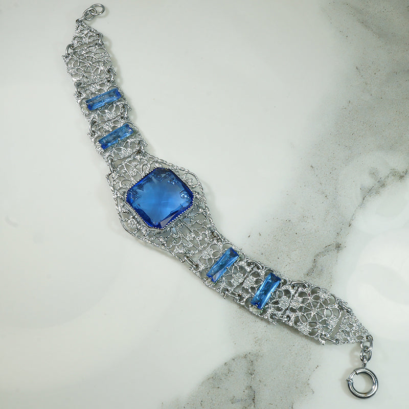 Chrome Filigree Blue Glass Deco Bracelet