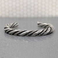 So Meta Twist within a Twist Coin Silver Cuff