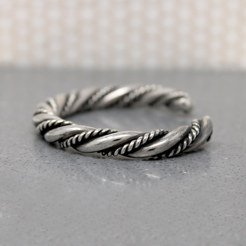 So Meta Twist within a Twist Coin Silver Cuff