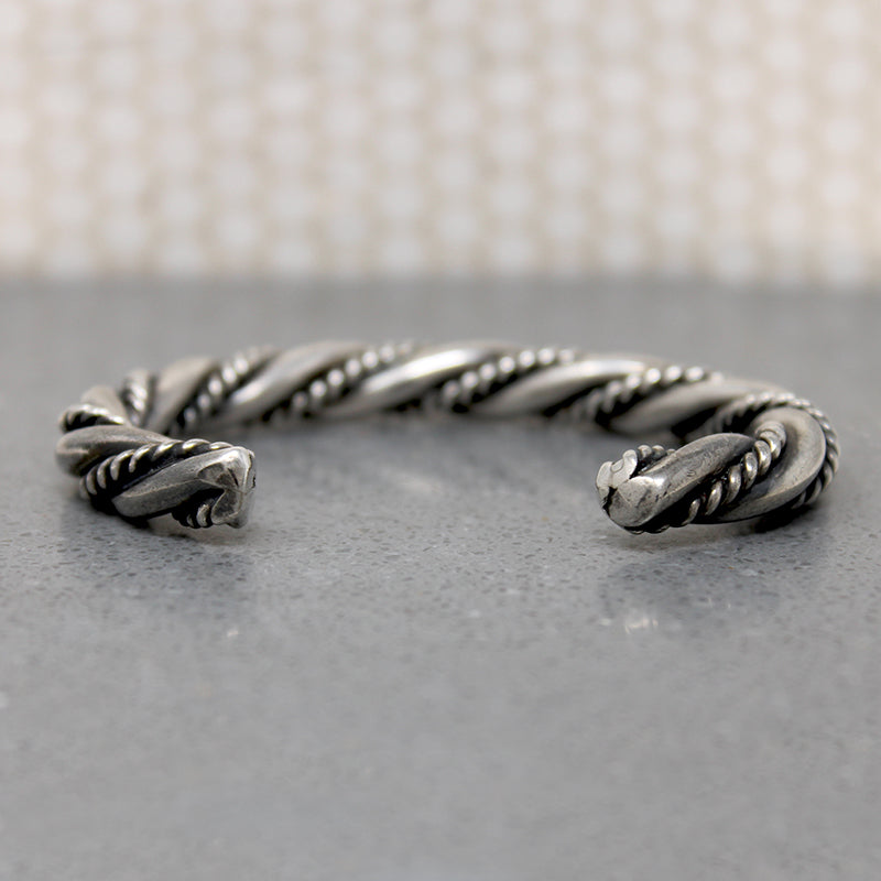 So Meta Twist within a Twist Coin Silver Cuff