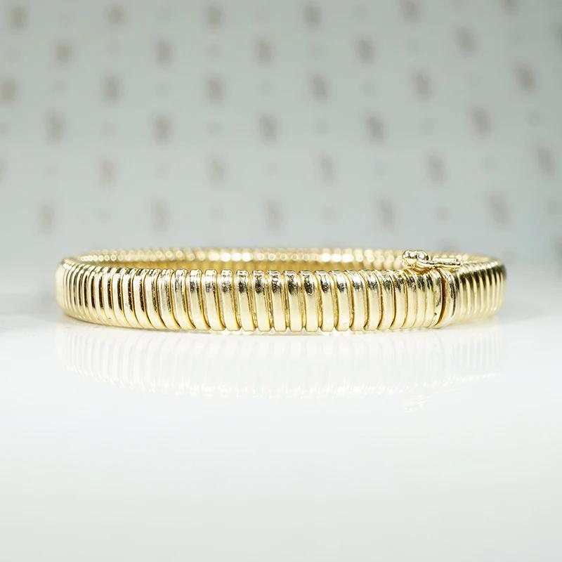 Slinky Mid Century Gold Gas Pipe Bracelet