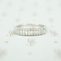 10 straight baguettes set vertically in platinum mid 20th century diamond band
