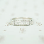 10 straight baguettes set vertically in platinum mid 20th century diamond band